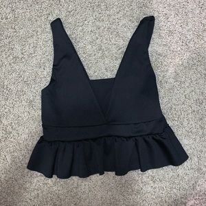 Black cropped top.
